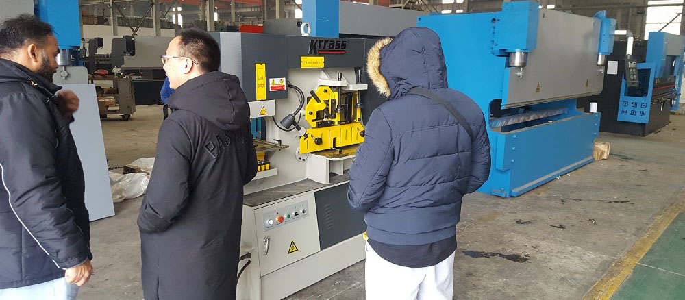 Hydraulic Ironworker Saudi Arabian agent leads his customer to inspect the goods