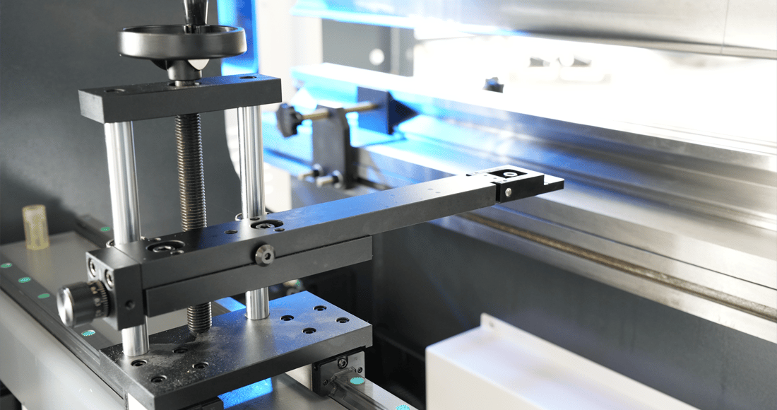 Adjustable lift back gauge for KRRASS press brake