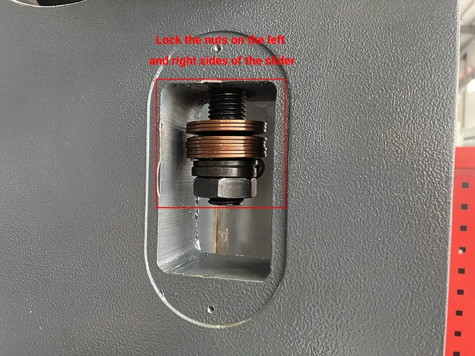 Lock the nuts on the left and right sides of the slider