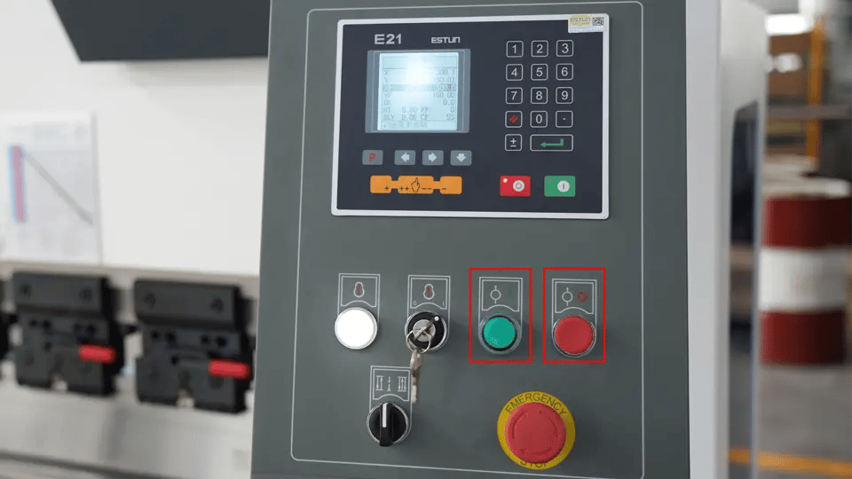 Oil pump main motor start (green) and stop (red) buttons