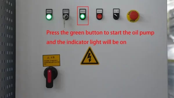 Press the green button to start the oil pump