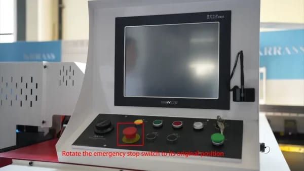 Rotate the emergency stop switch to its original position