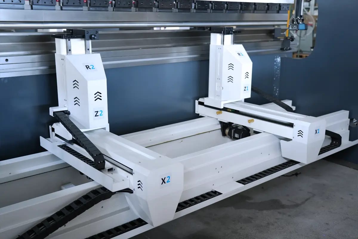 Pictures Dynamic Positioning: The Multi-Axis CNC Backgauge System