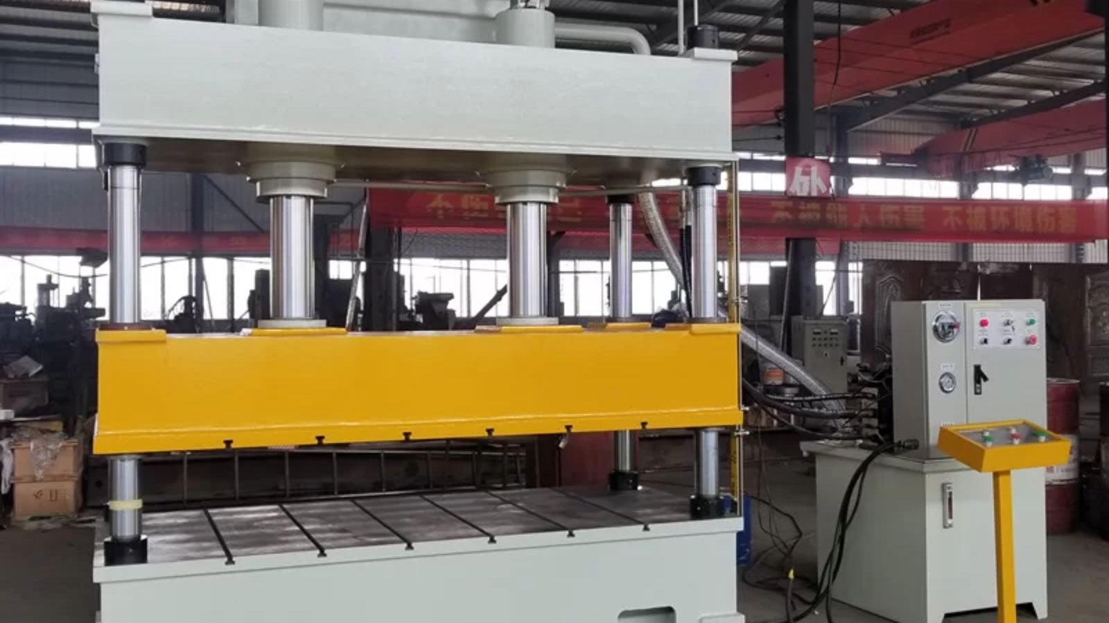 Working principle of four-column hydraulic press machine