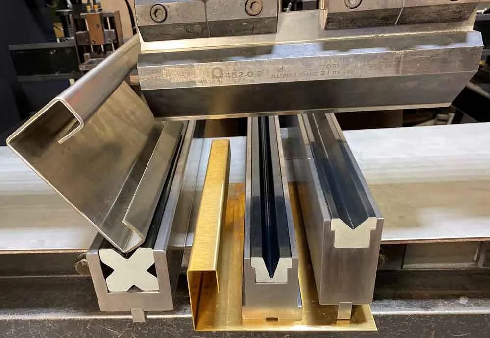 Figure 11: These composite urethane dies in machined steel holders can bend up to 10-ga. stainless steel.