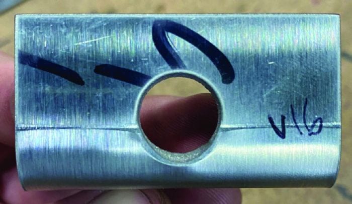 Fig. 5 - Here, a 0.630-in.-thick, 88-deg. V die was used. This minimized the deformation but did not eliminate it.