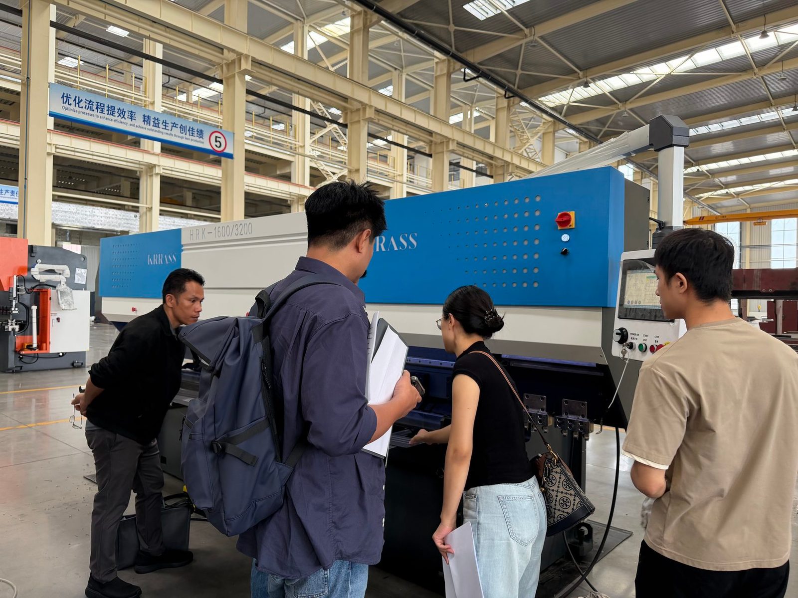 Pictures Global customers touring KRRASS sheet metal machinery production workshop