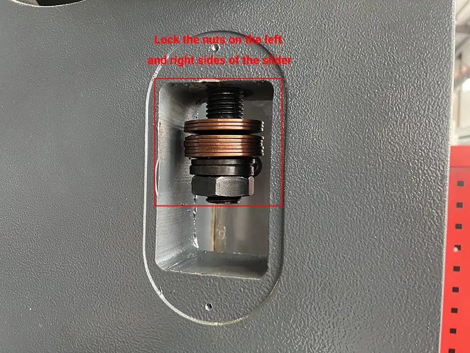 Lock the nuts on the left and right sides of the slider