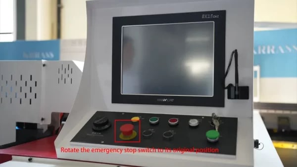 Rotate the emergency stop switch to its original position