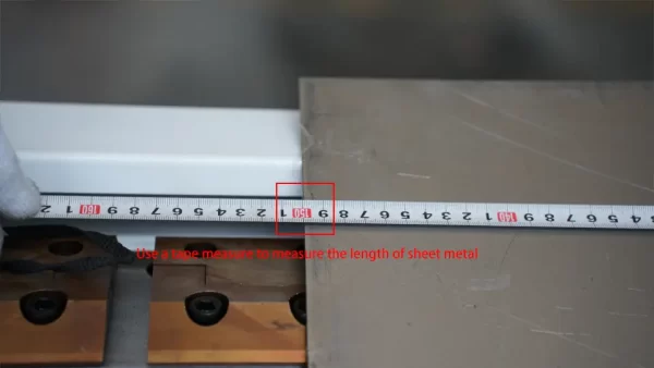 Use a tape measure to measure the length of sheet metal