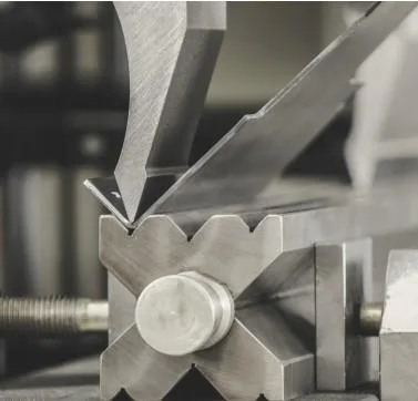 The fundamentals of press brake tooling - Pictures 16 Figure 12 The operator may choose from a variety of die-opening alternatives with this four-way die.